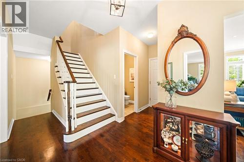 Foyer with stairs and dark wood-style flooring - 4165 Stonebridge Crescent, Burlington, ON - Indoor Photo Showing Other Room