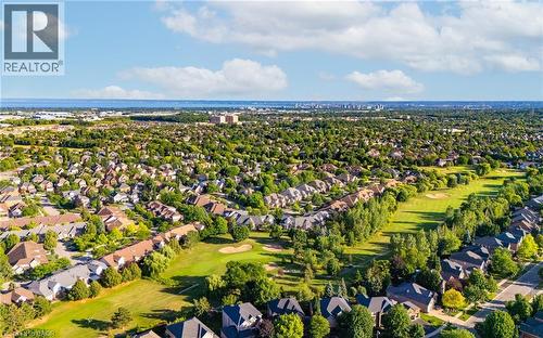 Aerial view of residential area with a golf club - 4165 Stonebridge Crescent, Burlington, ON - Outdoor With View