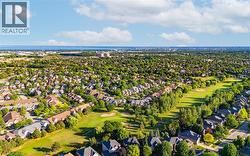 Aerial view of residential area with a golf club - 