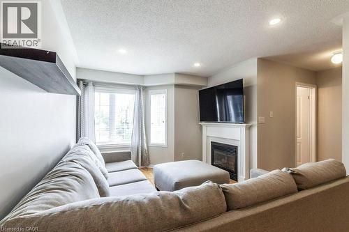 470 Beach Boulevard Unit# 8, Hamilton, ON - Indoor Photo Showing Living Room With Fireplace