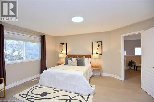 Bedroom with baseboards and light wood-style flooring - 5109 Blue Spruce Avenue, Burlington, ON - Indoor Photo Showing Bedroom