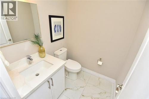 Bathroom with vanity and light marble finish floors - 5109 Blue Spruce Avenue, Burlington, ON - Indoor Photo Showing Bathroom
