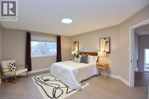 Bedroom with light wood-style floors and baseboards - 5109 Blue Spruce Avenue, Burlington, ON - Indoor Photo Showing Bedroom