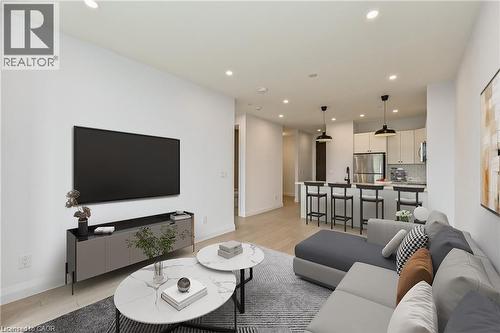 Virtually Staged - 101 Locke Street S Unit# 507, Hamilton, ON - Indoor Photo Showing Living Room