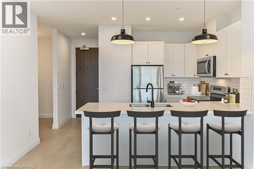 Virtually Staged - 101 Locke Street S Unit# 507, Hamilton, ON - Indoor Photo Showing Kitchen With Upgraded Kitchen