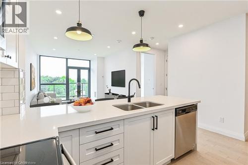 Virtually Staged - 101 Locke Street S Unit# 507, Hamilton, ON - Indoor Photo Showing Kitchen With Double Sink With Upgraded Kitchen