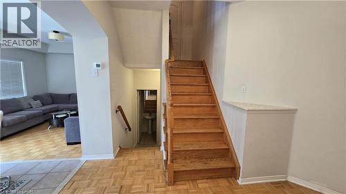 Stairway with parquet floors and arched walkways - 3688 Emery Drive, Mississauga, ON - Indoor Photo Showing Other Room