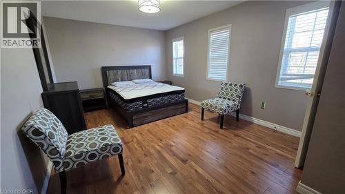 Bedroom with baseboards and hardwood / wood-style flooring - 3688 Emery Drive, Mississauga, ON - Indoor Photo Showing Bedroom