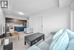 Living area featuring light wood-type flooring - 