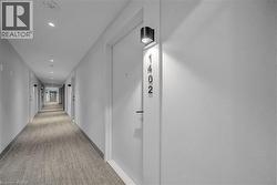 Hall featuring recessed lighting and carpet flooring - 