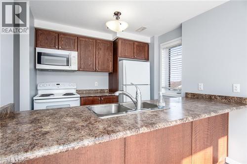 234 Rachel Crescent Unit# E, Kitchener, ON - Indoor Photo Showing Kitchen With Double Sink