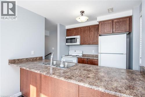 234 Rachel Crescent Unit# E, Kitchener, ON - Indoor Photo Showing Kitchen With Double Sink