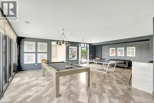Playroom with pool table and light wood finished floors - 15 Glebe Street Unit# 1511, Cambridge, ON - Indoor Photo Showing Other Room