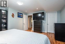 Bedroom featuring light wood-type flooring and recessed lighting - 