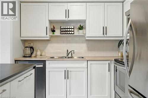 247 Fall Fair Way, Binbrook, ON - Indoor Photo Showing Kitchen With Double Sink