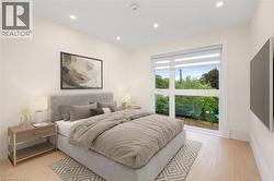 Bedroom featuring recessed lighting and light wood finished floors - 