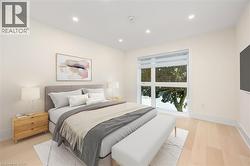 Bedroom featuring recessed lighting and baseboards - 
