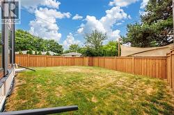 View of fenced backyard - 