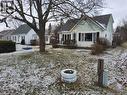 View of front of property featuring a chimney and a shingled roof - 509 Queensway W, Simcoe, ON  - Outdoor With Facade 