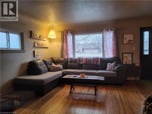 Living room with hardwood / wood-style floors - 509 Queensway W, Simcoe, ON - Indoor Photo Showing Living Room
