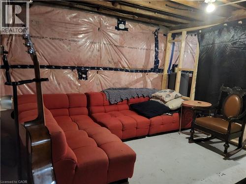 View of unfinished basement area used as a sitting area - 509 Queensway W, Simcoe, ON - Indoor Photo Showing Basement