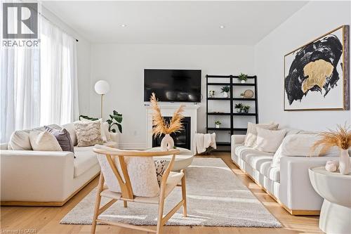 66 Cesar Place, Ancaster, ON - Indoor Photo Showing Living Room With Fireplace