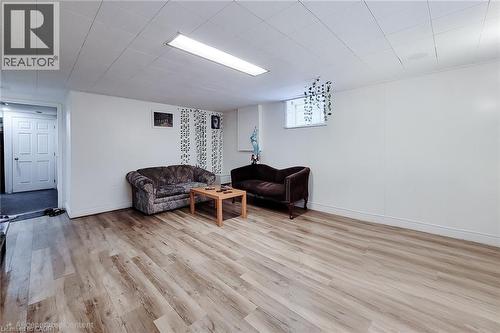 Sitting room with light wood-style floors and baseboards - 758 Stone Church Road E, Hamilton, ON - Indoor