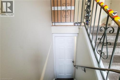 Stairway with healthy amount of natural light - 758 Stone Church Road E, Hamilton, ON - Indoor Photo Showing Other Room