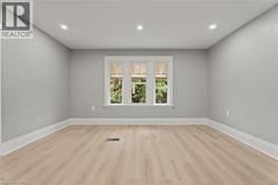 Unfurnished room with light wood-style floors and recessed lighting - 
