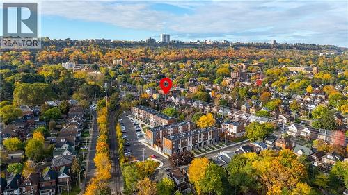 Aerial overview of property's location with nearby urban area - 88 Gage Avenue S, Hamilton, ON - Outdoor With View