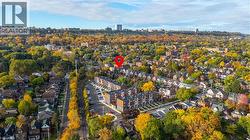 Aerial overview of property's location with nearby urban area - 