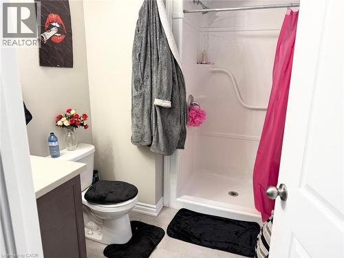 Bathroom with a shower stall and vanity - 65 Old School Trail Unit# 36, Welland, ON - Indoor Photo Showing Bathroom