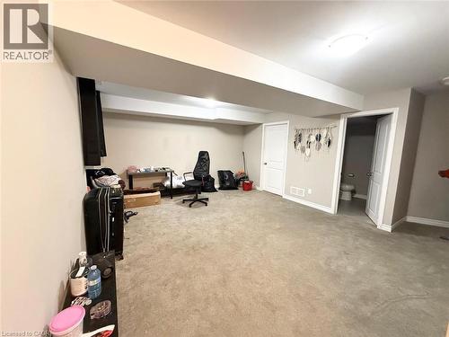 Workout room featuring carpet flooring and baseboards - 65 Old School Trail Unit# 36, Welland, ON - Indoor