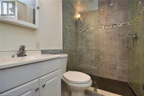 Bathroom featuring vanity, toilet, and a stall shower - 329 King Street E Unit# 3, Hamilton, ON - Indoor Photo Showing Bathroom