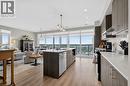 ustom pendant lighting - 15 Glebe Street Unit# 1313, Cambridge, ON  - Indoor Photo Showing Kitchen With Upgraded Kitchen 