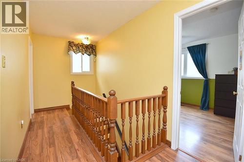 Stairs with wood finished floors and baseboards - 43 Niska Drive, Waterdown, ON - Indoor Photo Showing Other Room