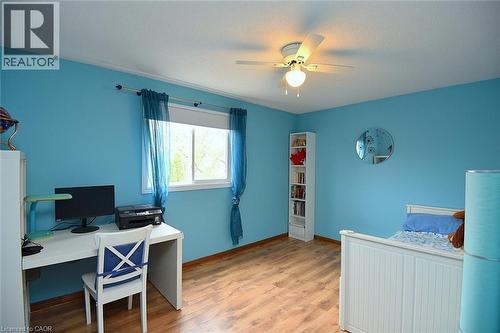 Bedroom featuring a desk, a ceiling fan, light wood-style floors, and a textured ceiling - 43 Niska Drive, Waterdown, ON - Indoor Photo Showing Office