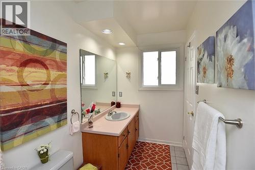 Bathroom featuring vanity, light tile patterned flooring, and recessed lighting - 43 Niska Drive, Waterdown, ON - Indoor Photo Showing Bathroom