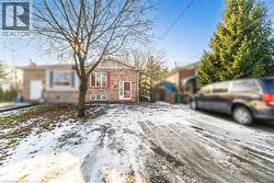 View of front facade featuring brick siding - 