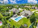 Drone / aerial view of a pool area - 86 Canters Close, Kitchener, ON  - Outdoor With In Ground Pool With View 