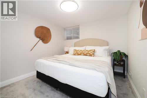 Bedroom featuring light colored carpet and baseboards - 238 Eagle Street S, Cambridge, ON - Indoor Photo Showing Bedroom