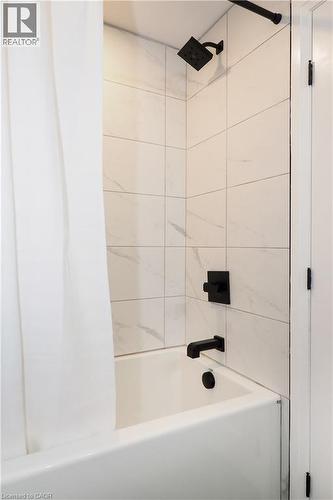 Full bathroom featuring washtub / shower combination - 238 Eagle Street S, Cambridge, ON - Indoor Photo Showing Bathroom