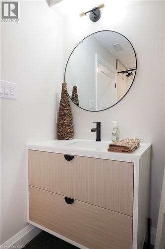 Bathroom featuring vanity and baseboards - 238 Eagle Street S, Cambridge, ON - Indoor