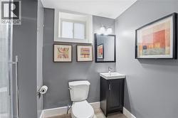 Bathroom featuring vanity and light wood finished floors - 