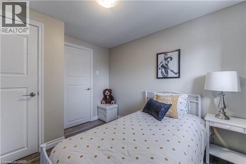 Bedroom featuring wood finished floors and baseboards - 156 Donald Street, Kitchener, ON - Indoor Photo Showing Bedroom