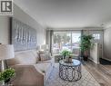 Living room featuring wood finished floors and baseboards - 156 Donald Street, Kitchener, ON  - Indoor Photo Showing Living Room 
