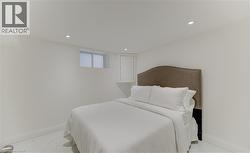 Bedroom featuring baseboards and recessed lighting - 