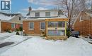Snow covered back of property featuring a chimney and brick siding - 569 Stirling Avenue S, Kitchener, ON  - Outdoor 