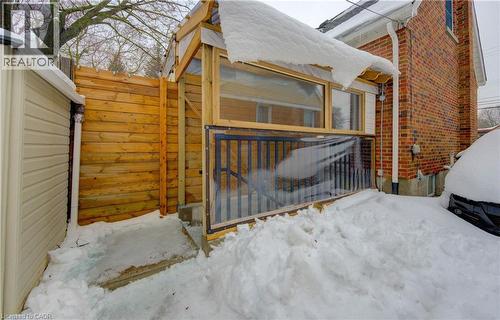 Gate with a wooden deck - 569 Stirling Avenue S, Kitchener, ON - Outdoor With Exterior