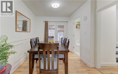 Dining room with light wood-style flooring - 569 Stirling Avenue S, Kitchener, ON - Indoor Photo Showing Dining Room